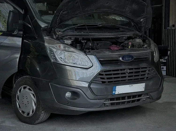 Transit Custom in for a pre-CVRT check at the Navan workshop