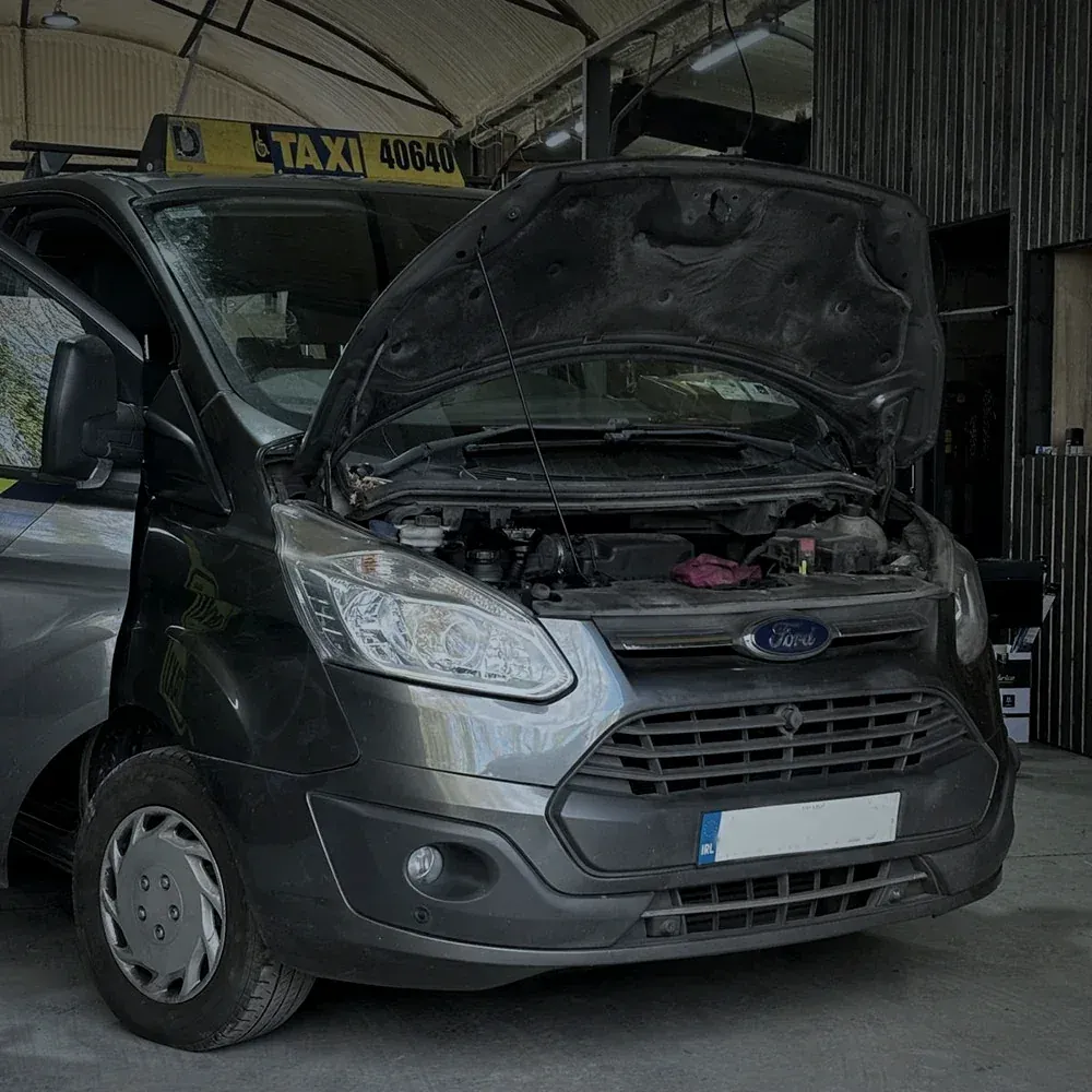 Working taxi in for maintenance at Alan Dawson Autoworks in Navan