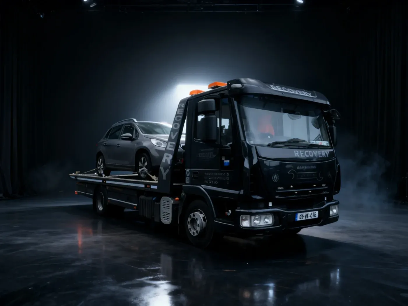 The Alan Dawson Autoworks recovery truck collecting a vehicle at a main dealer